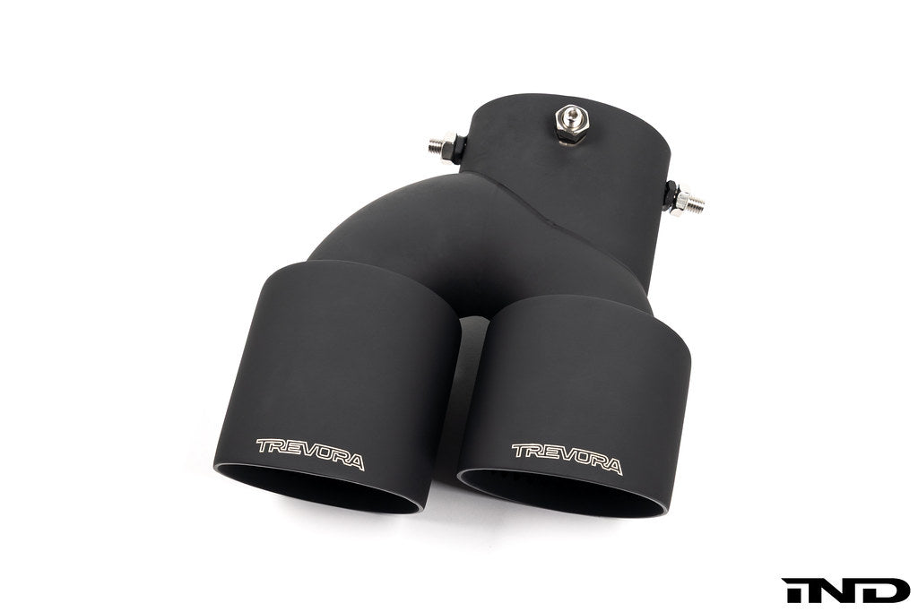 TREVORA G42 G2X 3 and 4 Series Cerakote black exhaust tip set mounted on car exhaust pipe, with a white background.
