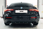 TREVORA G42 and G2X 3 and 4 Series Cerakote Black exhaust tips installed on vehicle exterior, showcasing sleek black finish.
