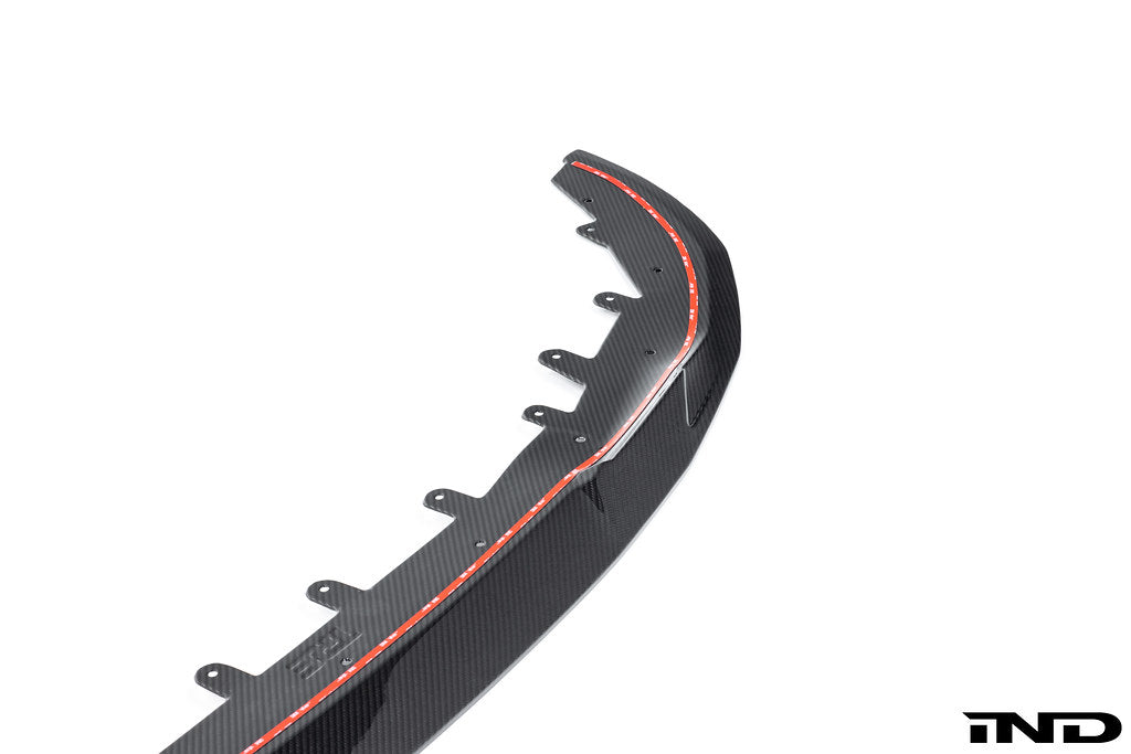 TREVORA G42 2-Series Carbon Fiber Front Splitter installed on a white BMW M240i, showcasing exterior automotive upgrade.