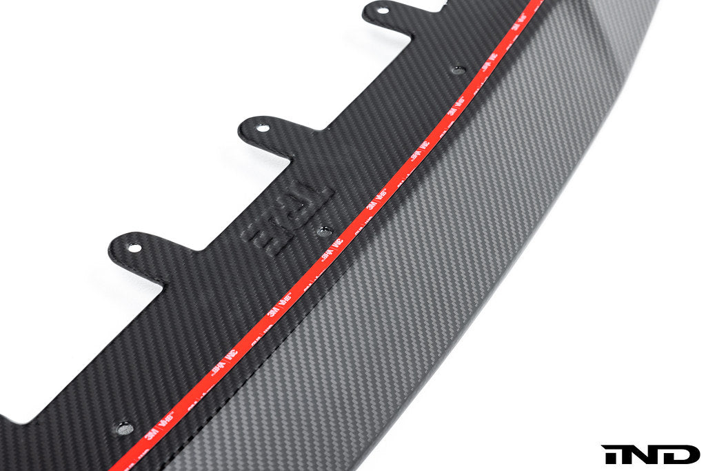 TREVORA G42 2-Series Carbon Fiber Front Splitter installed on a white BMW M240i, showcasing the sleek exterior design.