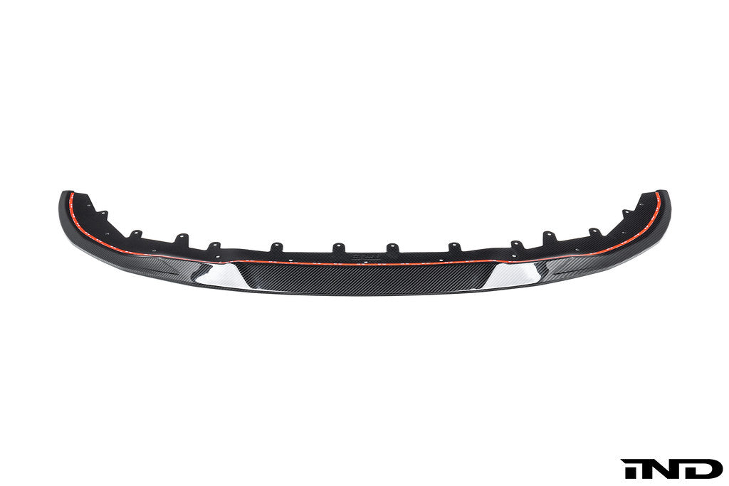TREVORA G42 2-Series carbon fiber front splitter installed on a BMW M240i, showcasing its sleek white exterior design.