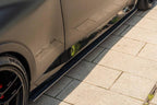TREVORA G42 2-Series M240i carbon fiber side skirt set installed on car exterior, showcasing sleek, lightweight design.
