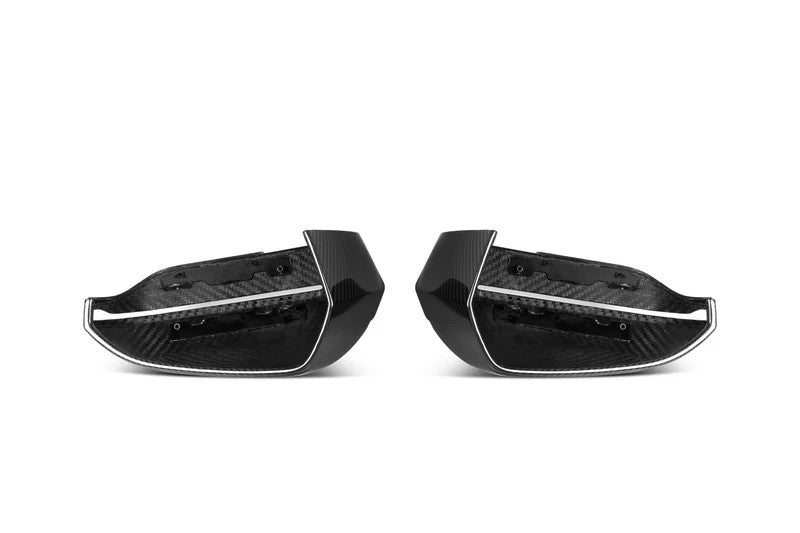 Pair of TREVORA G60 G61 5-Series and G45 X3 pre-preg carbon fiber mirror covers on a white background.