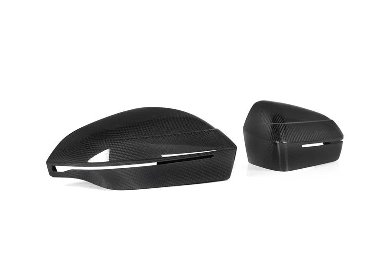 TREVORA G60 G61 G45 X3 carbon fiber mirror covers for 5-Series exterior, pair, with a white background.