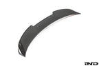 TREVORA G80 M3 carbon fiber PR-1 rear trunk spoiler mounted on white BMW G80 M3 exterior, showcasing aerodynamic design.