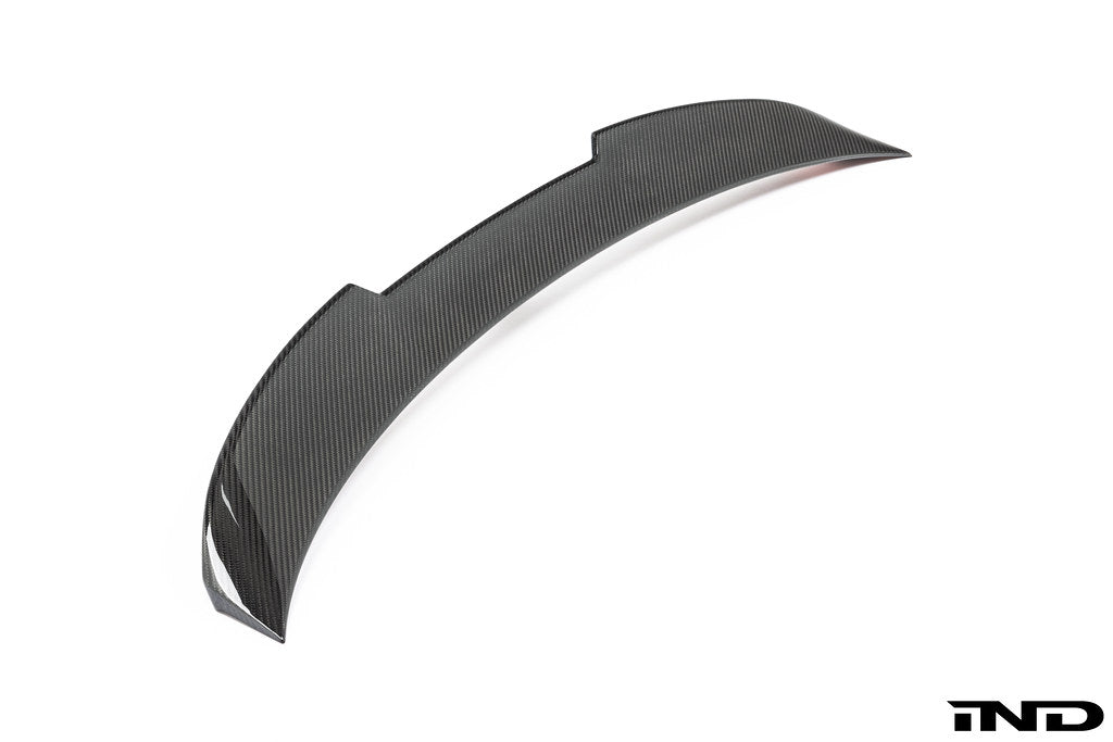 TREVORA G80 M3 carbon fiber PR-1 rear trunk spoiler mounted on white BMW G80 M3 exterior, showcasing aerodynamic design.