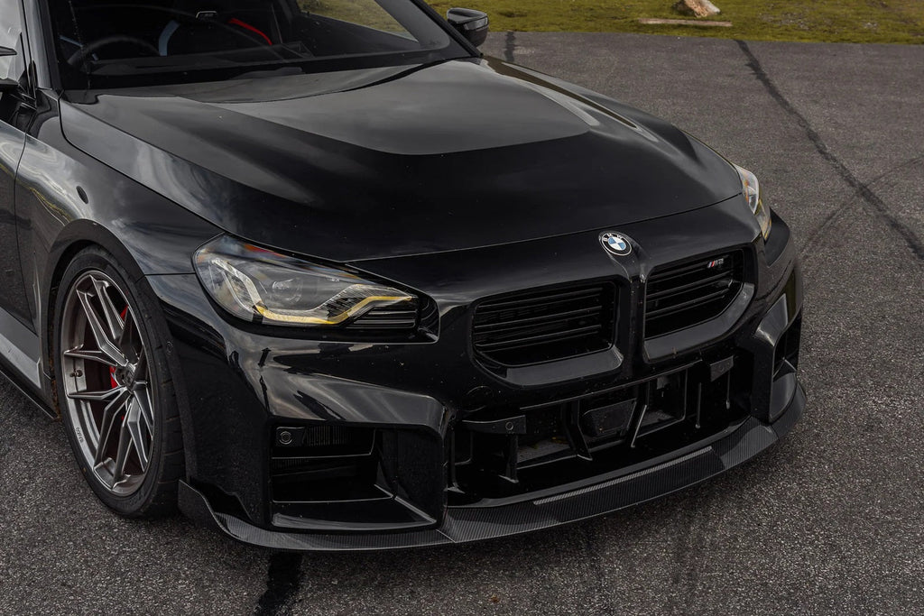 TREVORA G87 M2 Carbon front splitter with winglets installed on a BMW M2 exterior car modification.