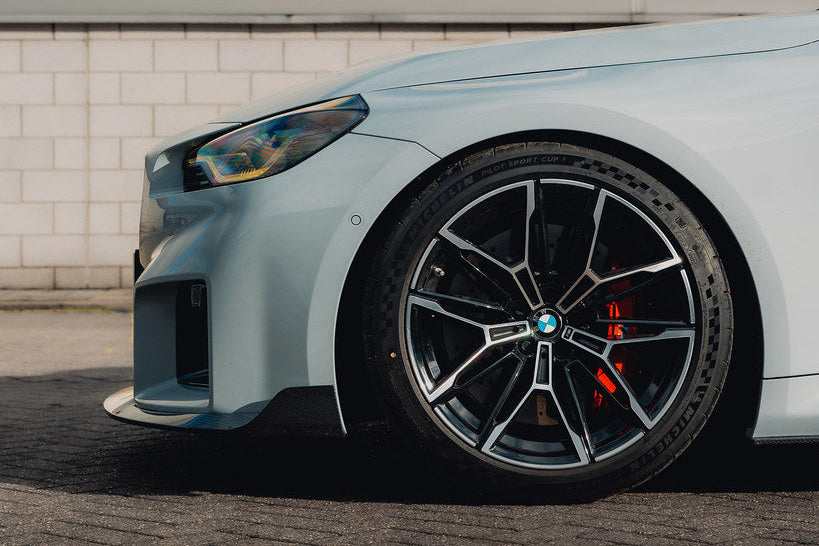 TREVORA G87 M2 carbon front splitter with winglets installed on a BMW M2 exterior car part.