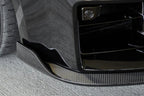 TREVORA G87 M2 Carbon front splitter with winglets installed on a BMW M2 exterior, showcasing aerodynamic design and performance features.