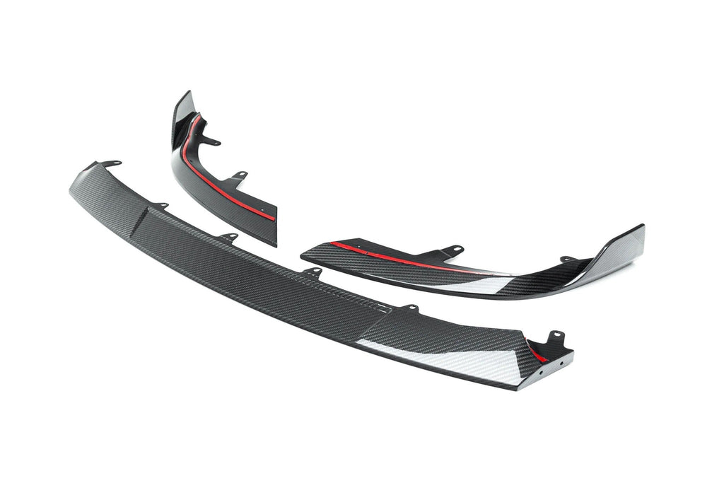 TREVORA G87 M2 Carbon front splitter with winglets for BMW M2, shown on white background, highlighting aerodynamic exterior design.