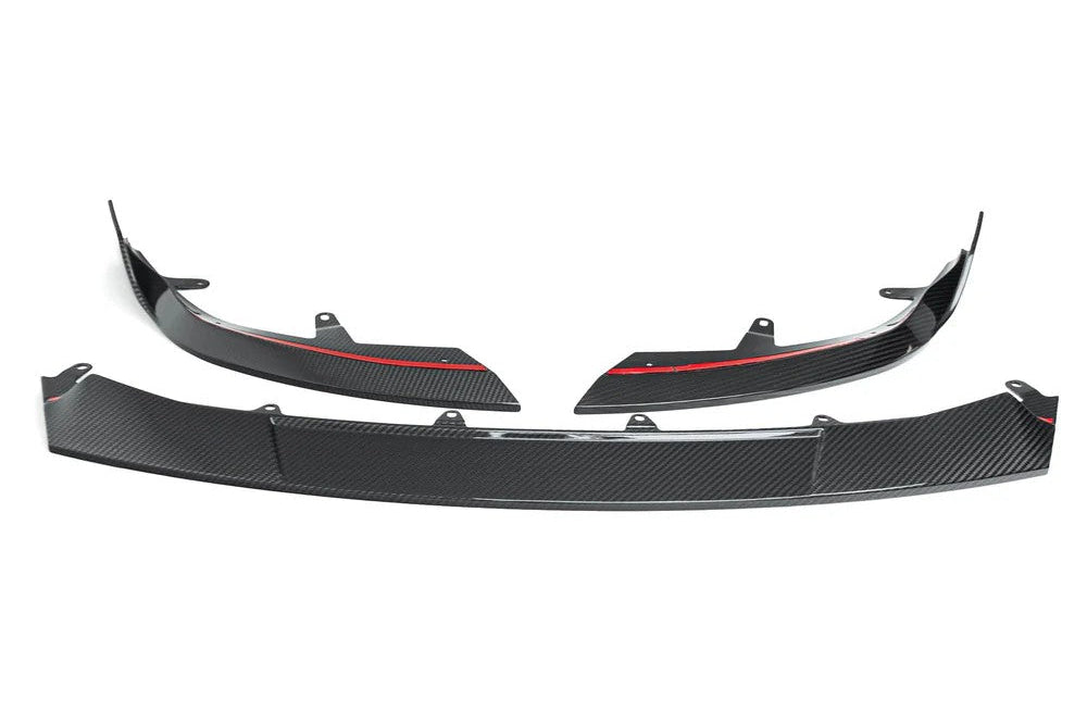 TREVORA G87 M2 carbon front splitter with winglets installed on a white background, showcasing aerodynamic exterior car enhancement.
