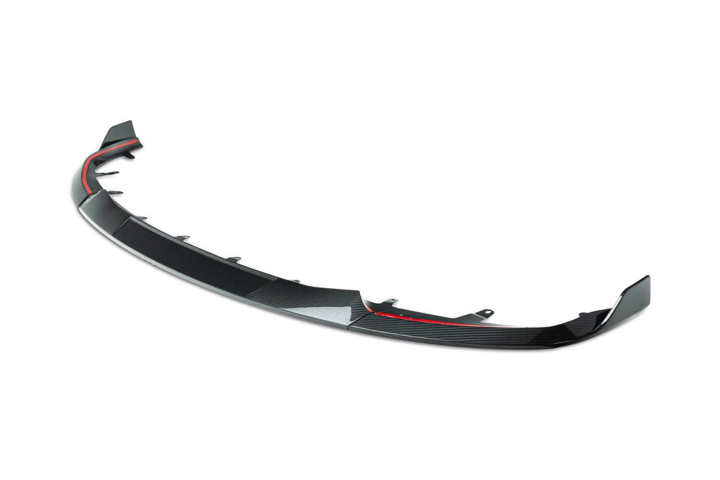 TREVORA G87 M2 carbon front splitter with winglets, exterior car aerodynamic component on white background.