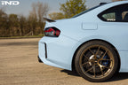 TREVORA G87 M2 Carbon exterior rear spoiler installed on a car, showcasing its sleek design and lightweight carbon fiber construction.