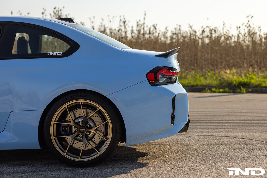 TREVORA G87 M2 Carbon rear spoiler installed on a car, showcasing the sleek exterior design and lightweight carbon fiber material.