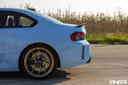 TREVORA G87 M2 Carbon rear spoiler installed on a car, showcasing the sleek exterior design and lightweight carbon fiber material.