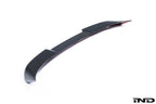 TREVORA G87 M2 Carbon ID-01 rear spoiler installed on BMW G87 M2, showcasing sleek exterior design on a white background