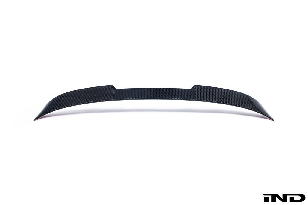 TREVORA G87 M2 Carbon rear spoiler mounted on white background, showcasing sleek exterior car accessory with aerodynamic design.