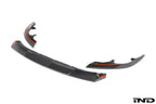 White TREVORA G87 M2 TR87 carbon flat front splitter for vehicle exterior, showcasing its aerodynamic design and sleek finish.