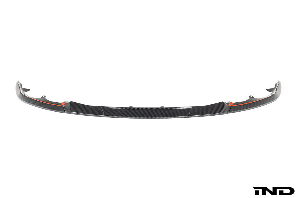 White TREVORA G87 M2 TR87 carbon flat front splitter for exterior car enhancement, showcasing its aerodynamic design.