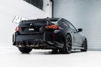 TREVORA G87 M2 TR87 Carbon Rear Diffuser installed on exterior of BMW M2, showcasing aerodynamic performance and sleek design
