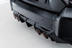 TREVORA G87 M2 TR87 carbon rear diffuser installed on a car, showcasing its sleek, aerodynamic exterior design.