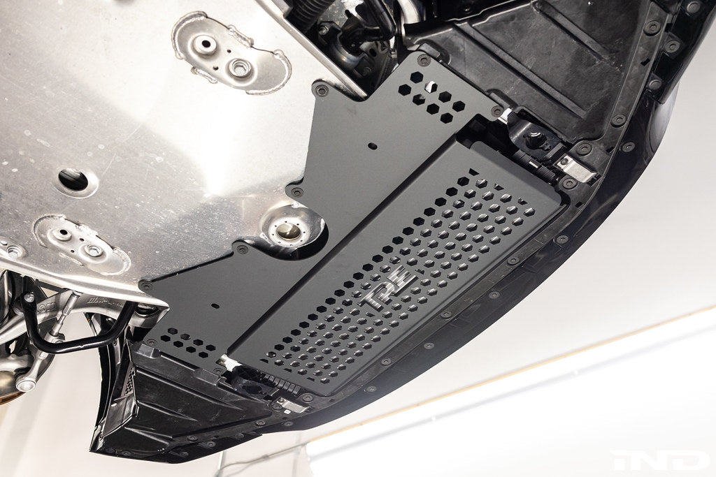 TREVORA G8X M2 M3 M4 metal skid plate and arch clearance kit installed on vehicle exterior, showing protection and fitment.