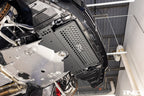 TREVORA G8X M2 M3 M4 metal skid plate and arch clearance kit installed on the vehicle's exterior underside.