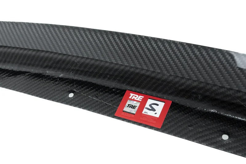 TREVORA G8X M3 M4 carbon fiber front splitter installed on a vehicle, showcasing a sleek exterior upgrade with pre-preg carbon material.