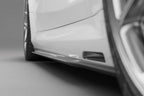 TREVORA G90 G99 M5 carbon fiber side skirts installed on a vehicle, showcasing sleek exterior upgrade and aerodynamic design.