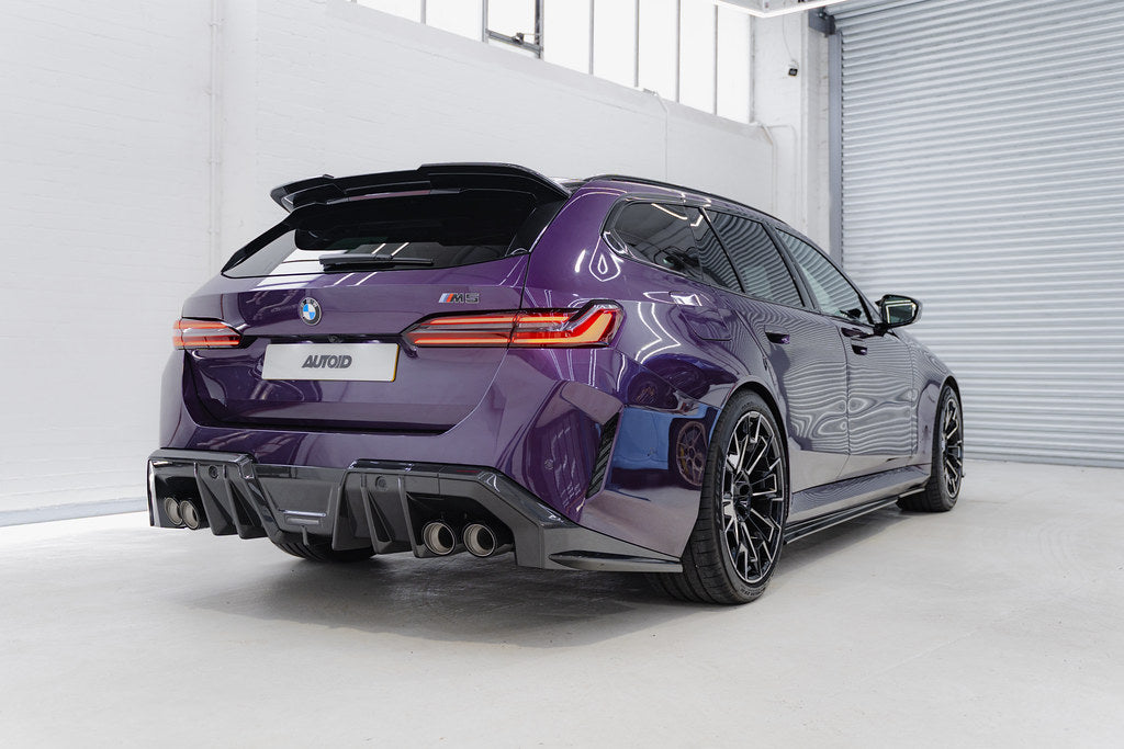 TREVORA G90 G99 M5 carbon fiber side skirts installed on a vehicle, highlighting sleek exterior design and aerodynamic styling
