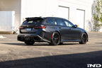 TREVORA G99 M5 Carbon Fiber Rear Roof Spoiler installed on a car, showcasing sleek exterior design and aerodynamic styling.