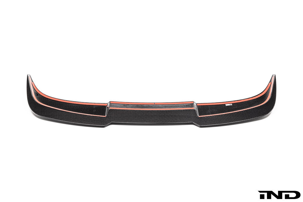 TREVORA G99 M5 Carbon Fiber PR-1 rear roof spoiler mounted on a white car exterior, showcasing sporty aerodynamic design.