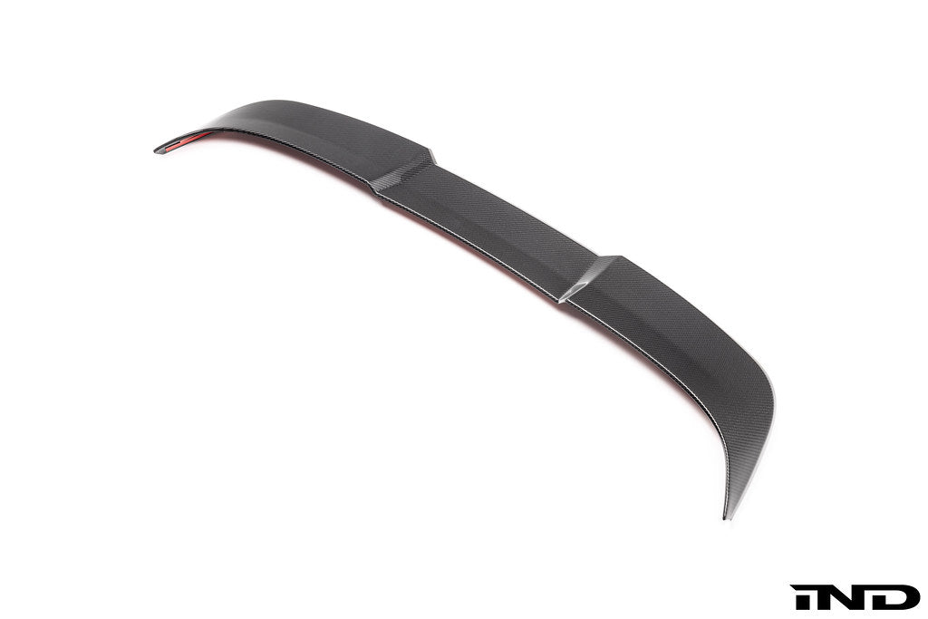 TREVORA G99 M5 Carbon Fiber PR-1 rear roof spoiler on white exterior, sleek aerodynamic accessory for M5 models