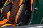 Wunderworks BMW M Carbon Bucket Seat upper bolster protector set installed in car interior, showing black carbon fiber protectors.
