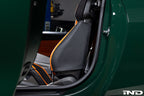 Wunderworks BMW M Carbon bucket seat upper bolster protector set installed in car interior, featuring black carbon fiber material.