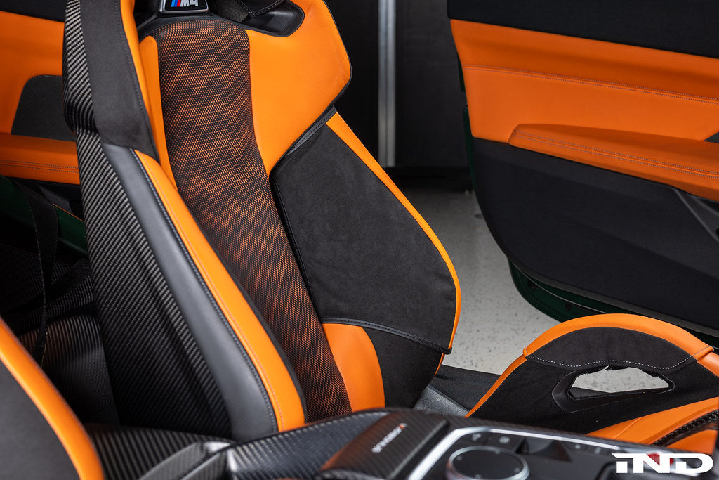 Wunderworks BMW M Carbon Bucket Seat upper bolster protector set installed in interior, showcasing sleek carbon finish and fit.