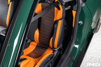 Wunderworks BMW M Carbon Bucket Seat upper bolster protector set installed in car interior, showcasing carbon fiber design and fit.