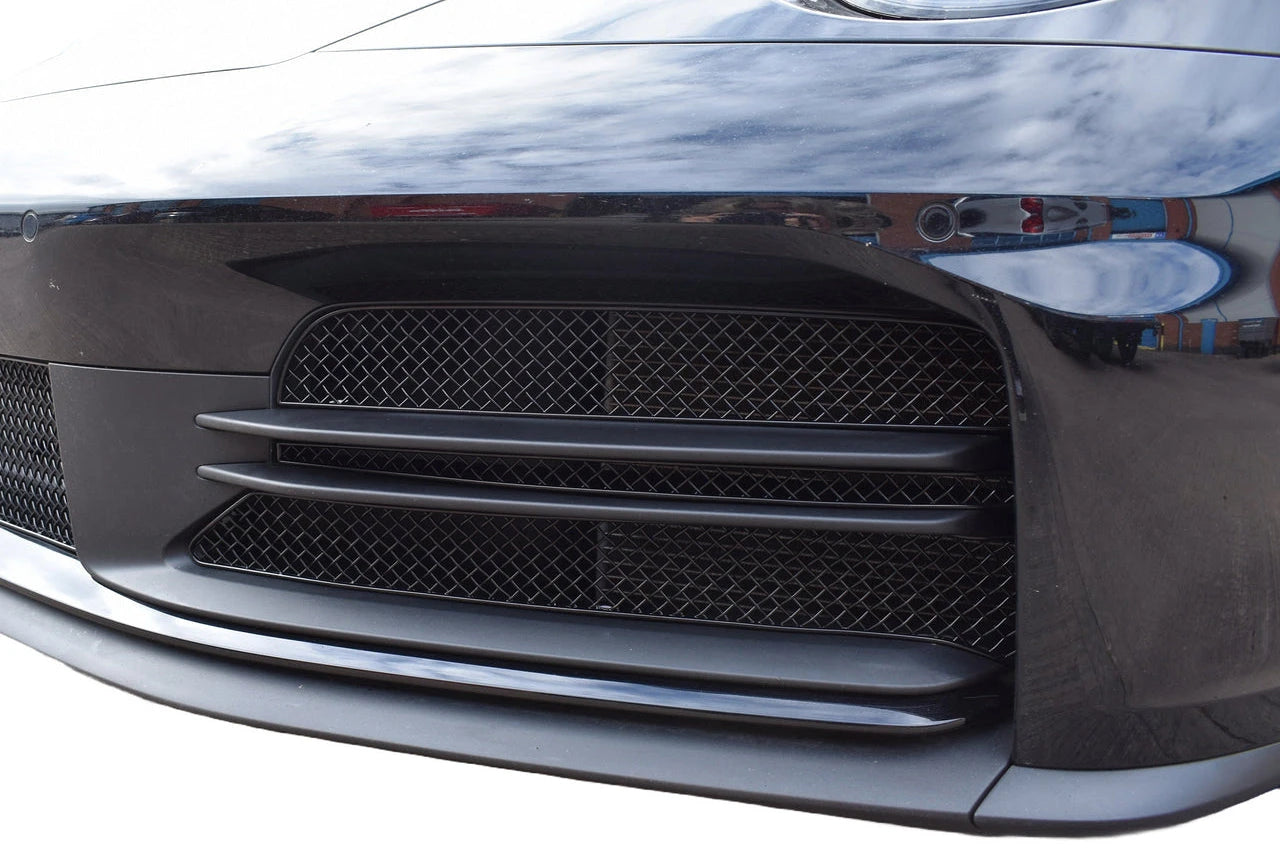 Zunsport Porsche Carrera 992.2 front lower grille set installed on the exterior of the car, showcasing the sleek black design.