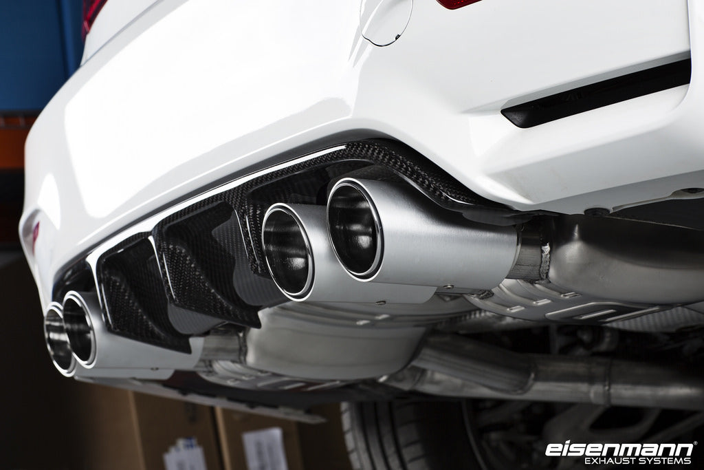 Eisenmann F8X M3/M4 performance exhaust system with valves, showing the sleek exhaust pipes and polished finish.