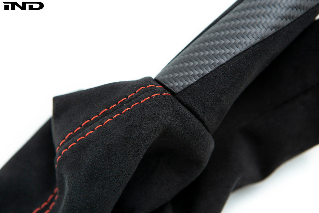 IND F87 M2 matte carbon stitched parking brake handle for car interior, featuring sleek design and premium stitching.