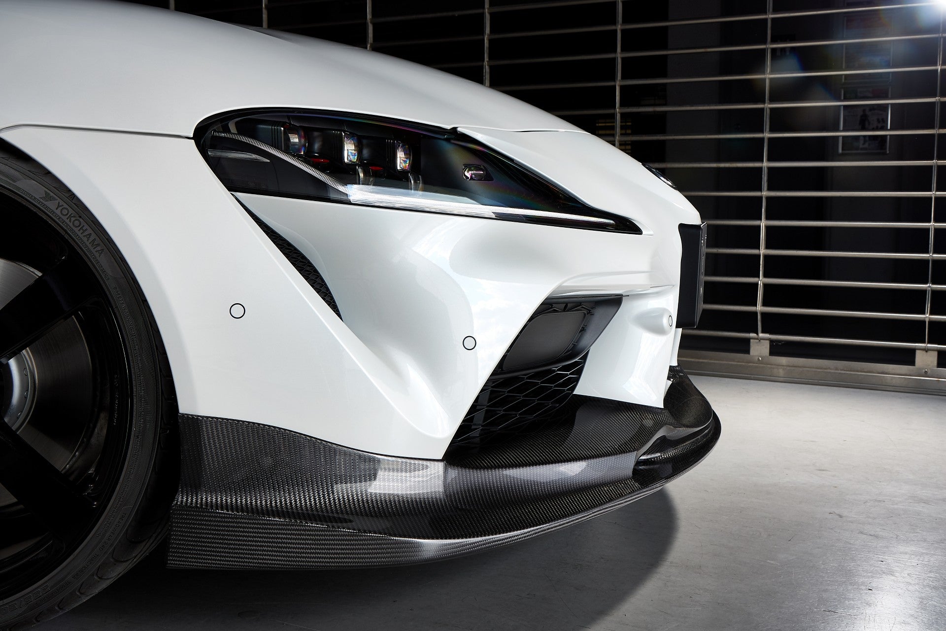 Side view of A90 Supra front bumper with 3D Design Carbon Front Lip