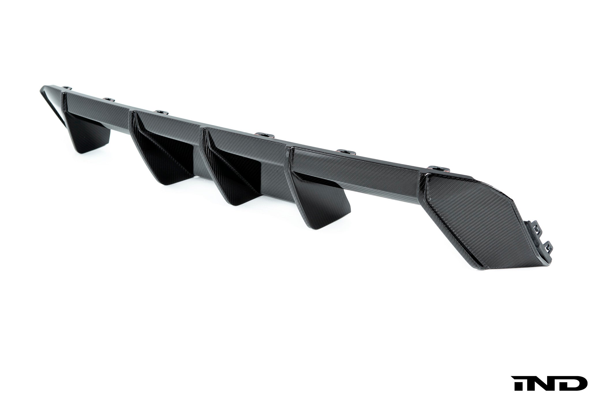 BMW M Performance G8X M3/M4 carbon rear diffuser showcasing sleek design and premium carbon fiber finish.