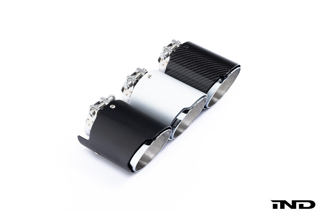 Eisenmann G8X M3/M4 performance exhaust system with valves, showcasing the polished metal and dual exhaust tips.
