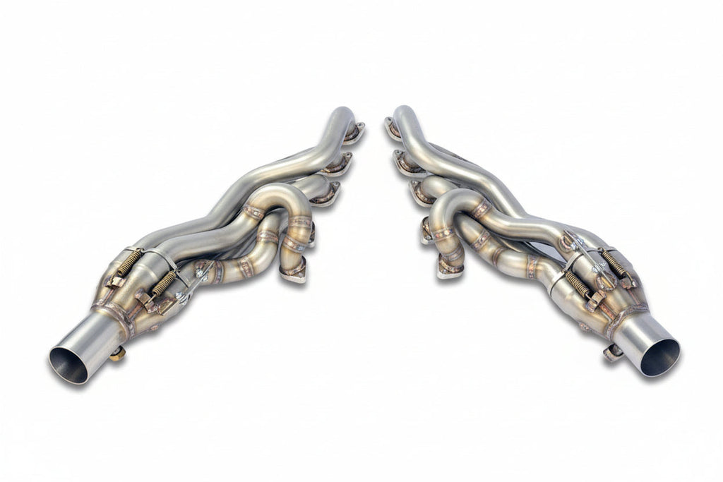 Supersprint stainless exhaust manifold set for BMW E6X M5 and M6, LHD and RHD models, showing polished metal components.