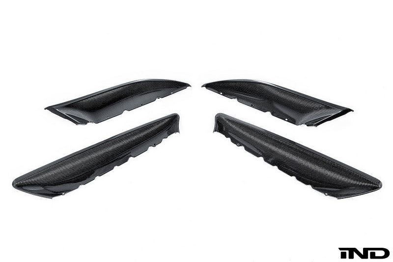 Alpha N F87 M2 carbon interior door card set with white background, showcasing sleek, lightweight carbon fiber design for BMW M2.