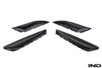 Alpha N F87 M2 carbon interior door card set with white background, showcasing sleek, lightweight carbon fiber design for BMW M2.