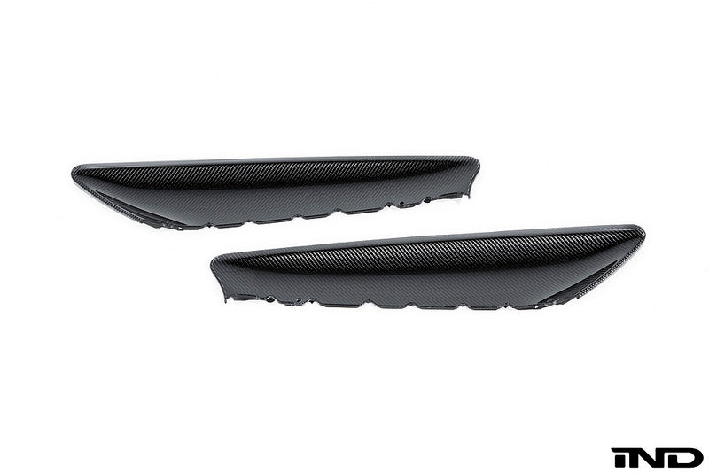 Alpha N F87 M2 carbon interior door card set with white background, showcasing sleek carbon fiber panels for BMW interior upgrade.