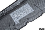 Alpha N Alpha-N F87 M2 carbon interior door card set with white background, showcasing sleek, lightweight carbon fiber panels.