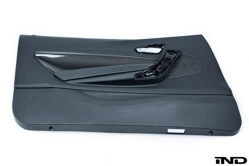 Alpha N F87 M2 carbon door card set for interior car customization, featuring sleek white finish and detailed craftsmanship.