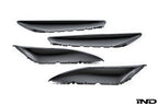 Alpha N F87 M2 carbon interior door card set with white background, showcasing sleek, lightweight carbon fiber material and detailed design.